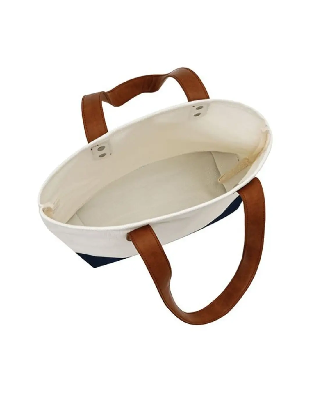 Open-top view of canvas tote with leather handles showing interior capacity for laptop and files