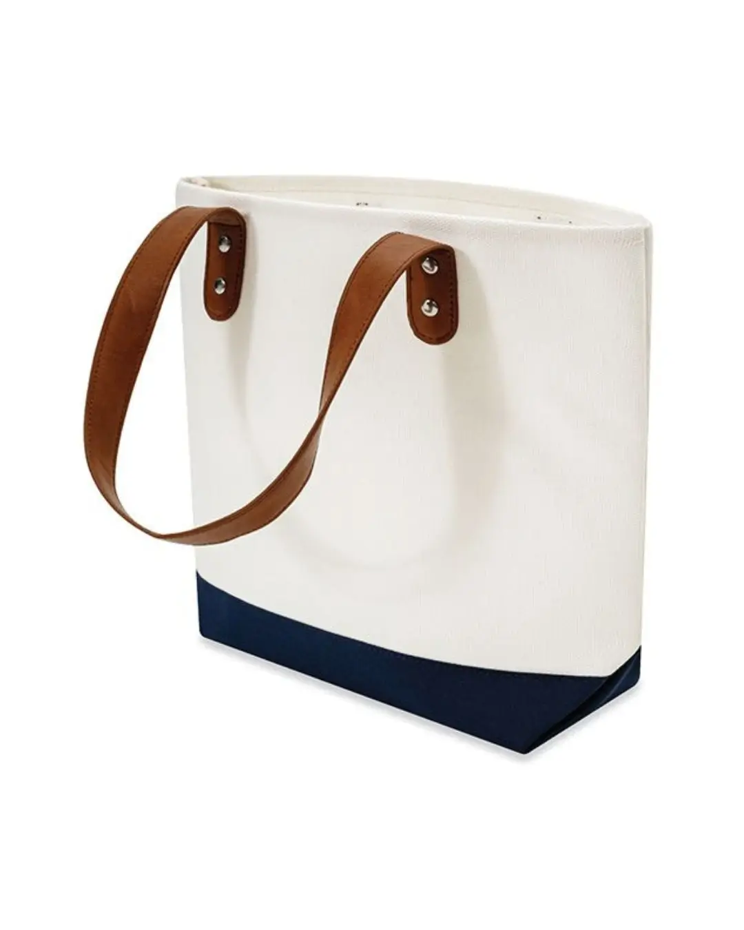 Side profile of premium canvas tote showing leather handle drop, gusset depth, and contrast base