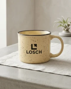 Custom camp mug in speckled ceramic with a printed logo on the front