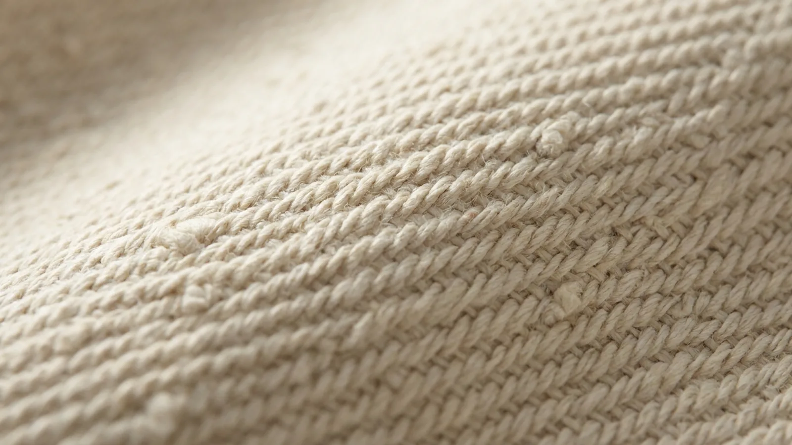Macro detail of 18 oz heavyweight cotton canvas weave showing tight twill structure