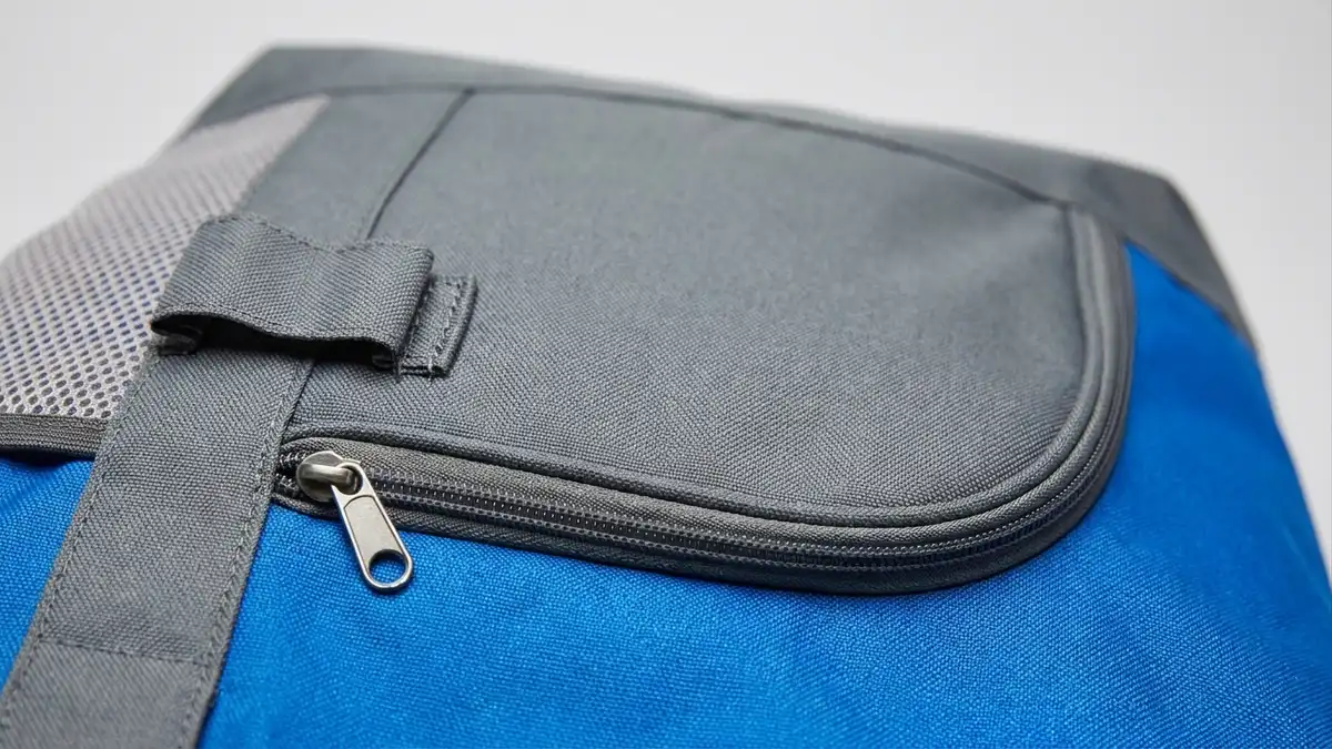 Zippered front pocket with pen loop on a custom sport beach tote bag — Brandevois