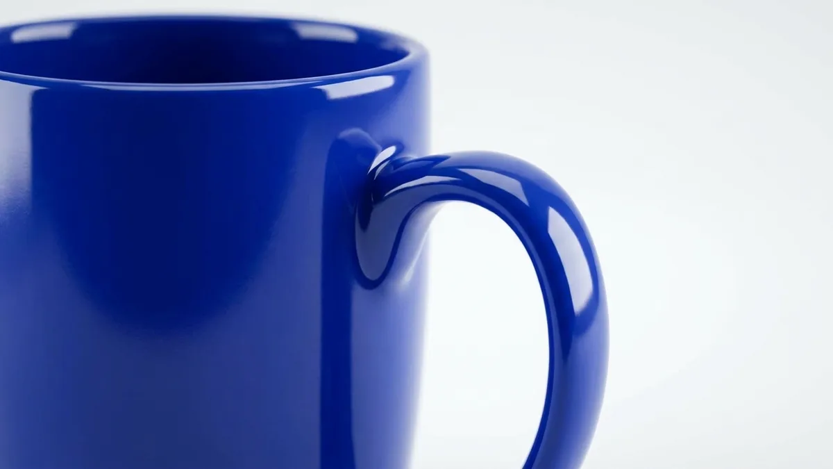 High curved grip handle on a custom 12 oz glossy ceramic coffee mug — Brandevois