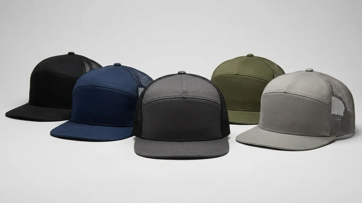 Custom 7-panel snapback trucker caps in several colors lined up — Brandevois