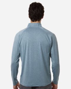 Custom embroidered quarter zips in Silverblue Heather, HUK Airweight heather pullover, on-model back