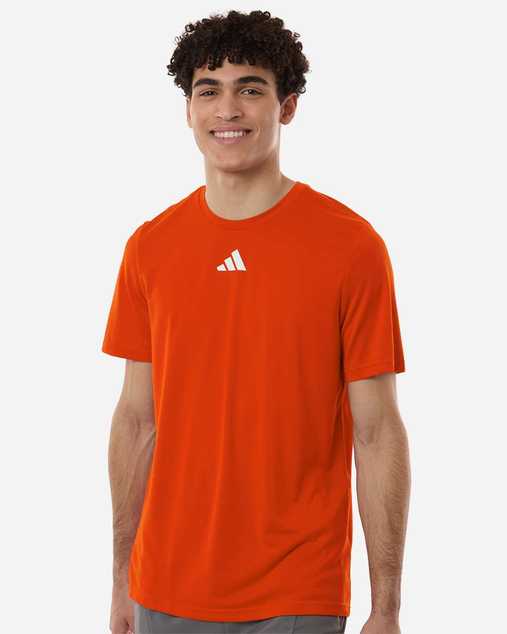 Custom Adidas shirts in Orange, men's Pregame performance tee, on-model front