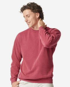 Custom crewneck sweatshirts, Comfort Colors garment-dyed crewneck in Crimson on model, front