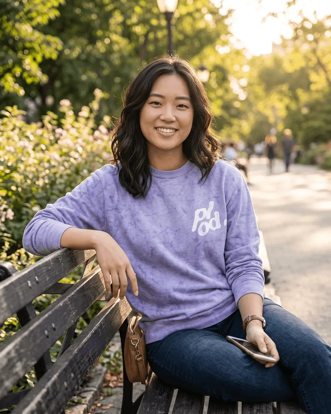 Custom crewneck sweatshirts in Colorblast, garment-dyed crewneck with a sample printed design, in use