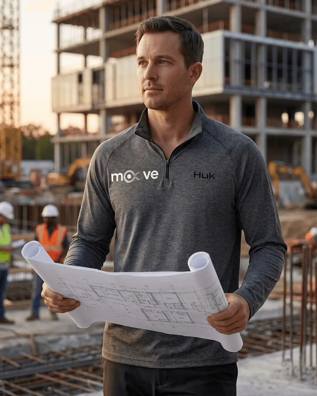 Custom embroidered quarter zips, HUK Airweight pullover with a sample embroidered logo, in use