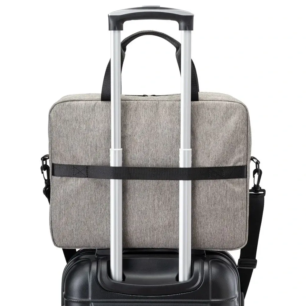 Custom laptop bags in graphite recycled heather, fits a 16 inch laptop, riding on a suitcase trolley handle