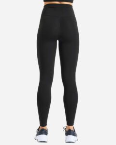 Model wearing custom leggings in Black from the back, showing the full-length fit and opaque matte fabric