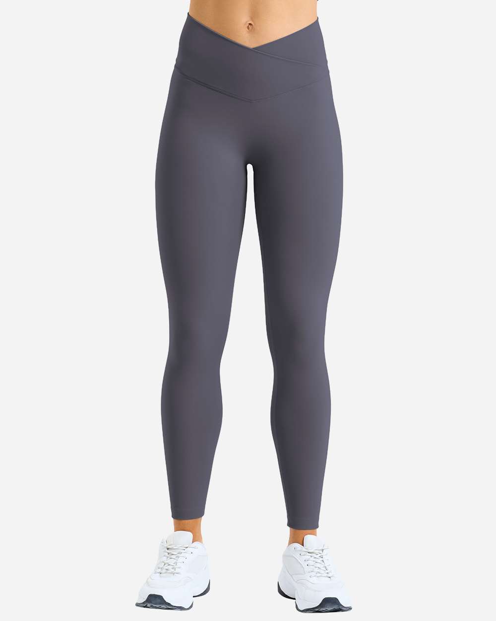 Model wearing custom leggings in Charcoal from the front, showing the high rise and crossover waistband fit